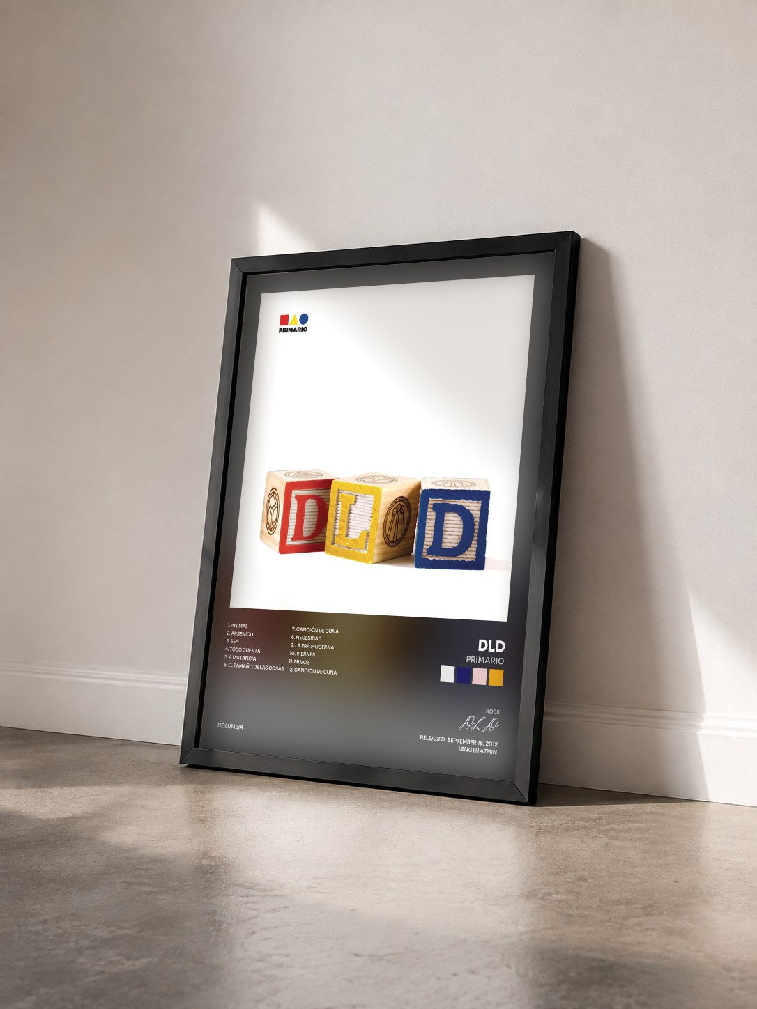 #noir Tableau de l'album Primario de DLD vu de trois quarts, cadre noir