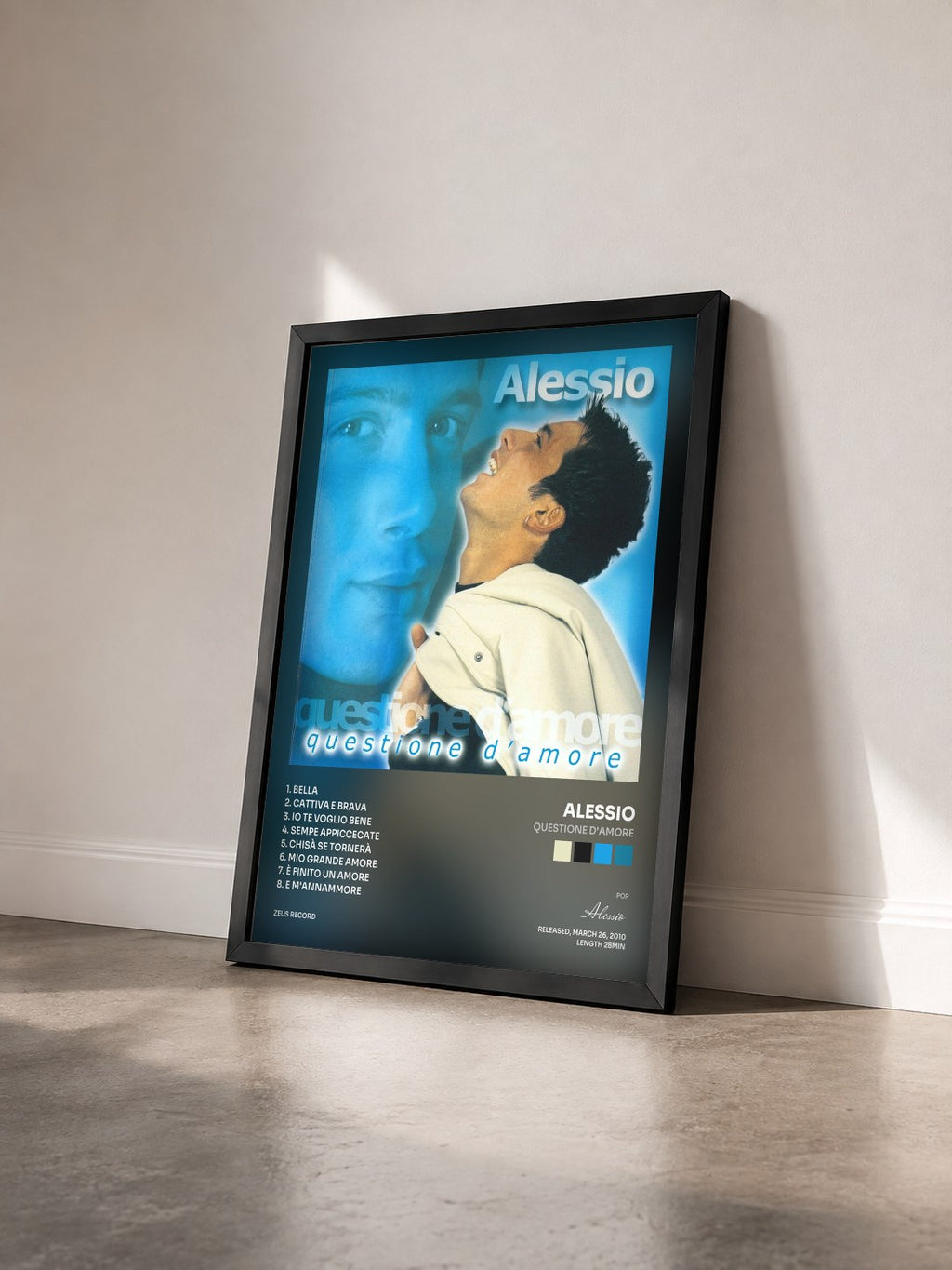 #noir Tableau de l'album Questione d'amore de Alessio vu de trois quarts, cadre noir