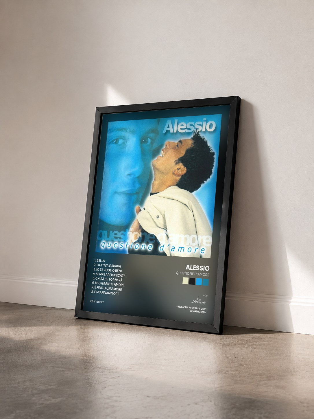 #noir Tableau de l'album Questione d'amore de Alessio vu de trois quarts, cadre noir