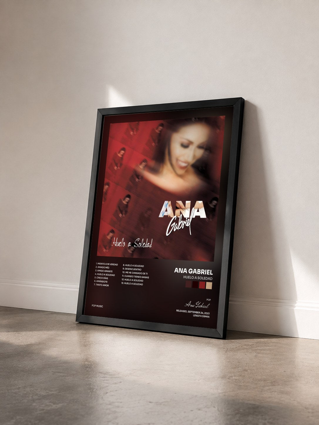 #noir Tableau de l'album Huelo a Soledad de Ana Gabriel vu de trois quarts, cadre noir