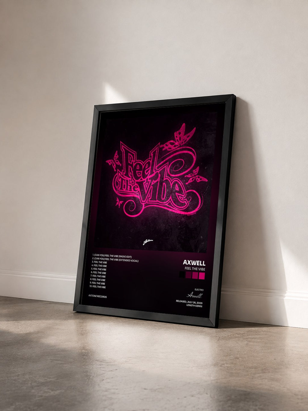 #noir Tableau de l'album Feel The Vibe de Axwell vu de trois quarts, cadre noir