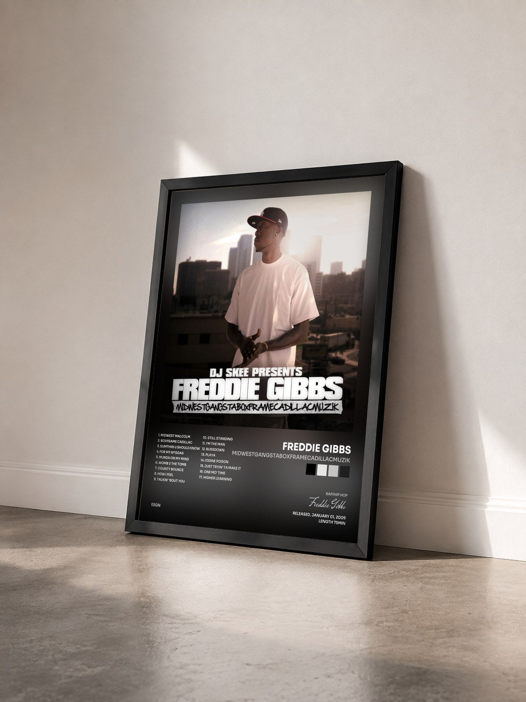 #noir Tableau de l'album Midwestgangstaboxframecadillacmuzik de Freddie Gibbs vu de trois quarts, cadre noir