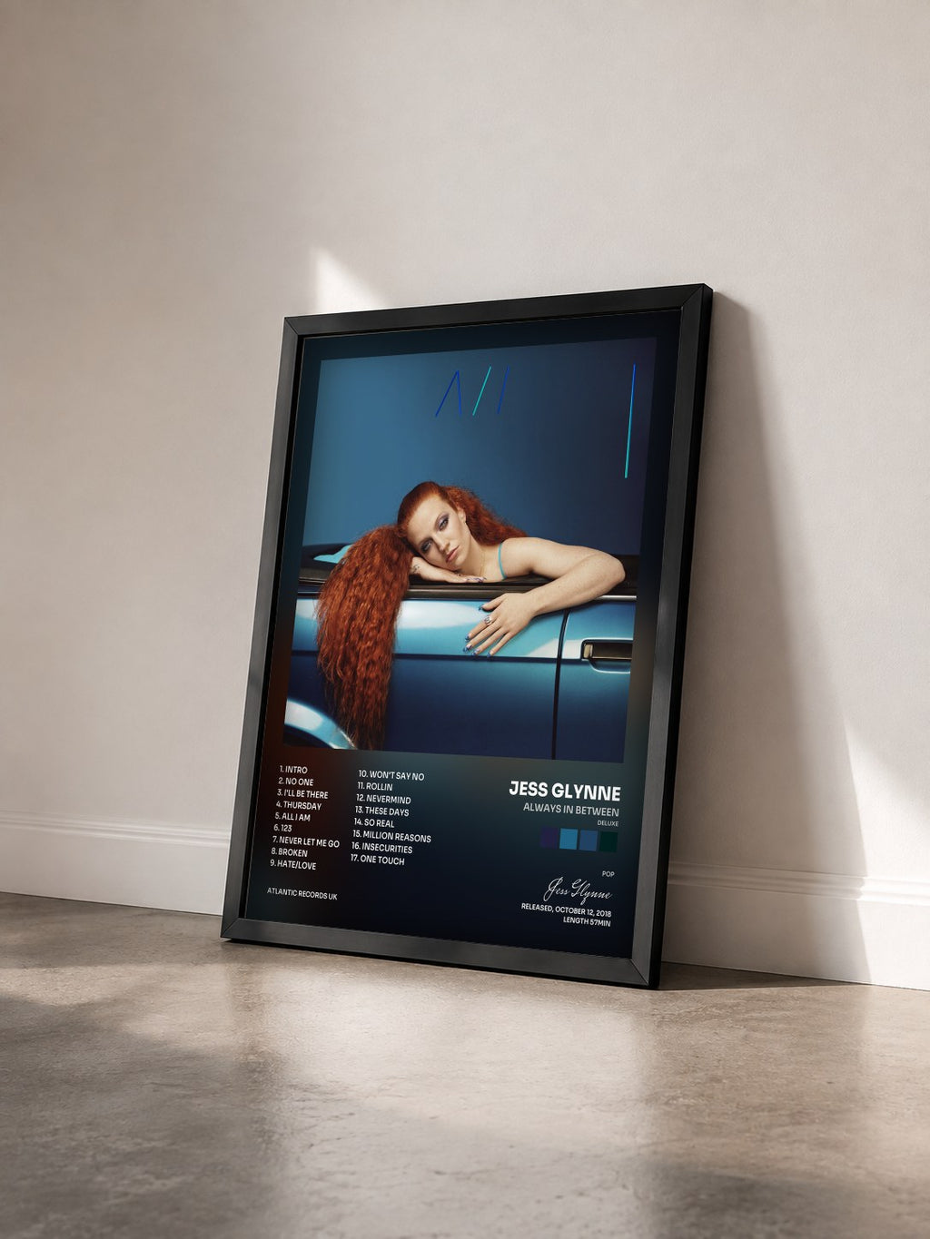 #noir Tableau de l'album Always in Between (Deluxe) de Jess Glynne vu de trois quarts, cadre noir
