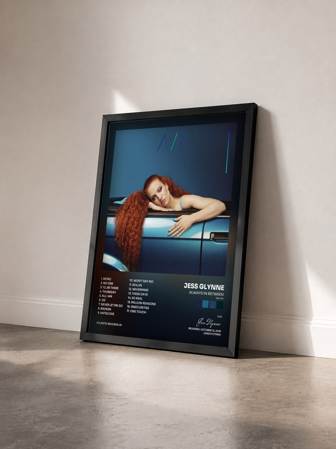#noir Tableau de l'album Always in Between (Deluxe) de Jess Glynne vu de trois quarts, cadre noir