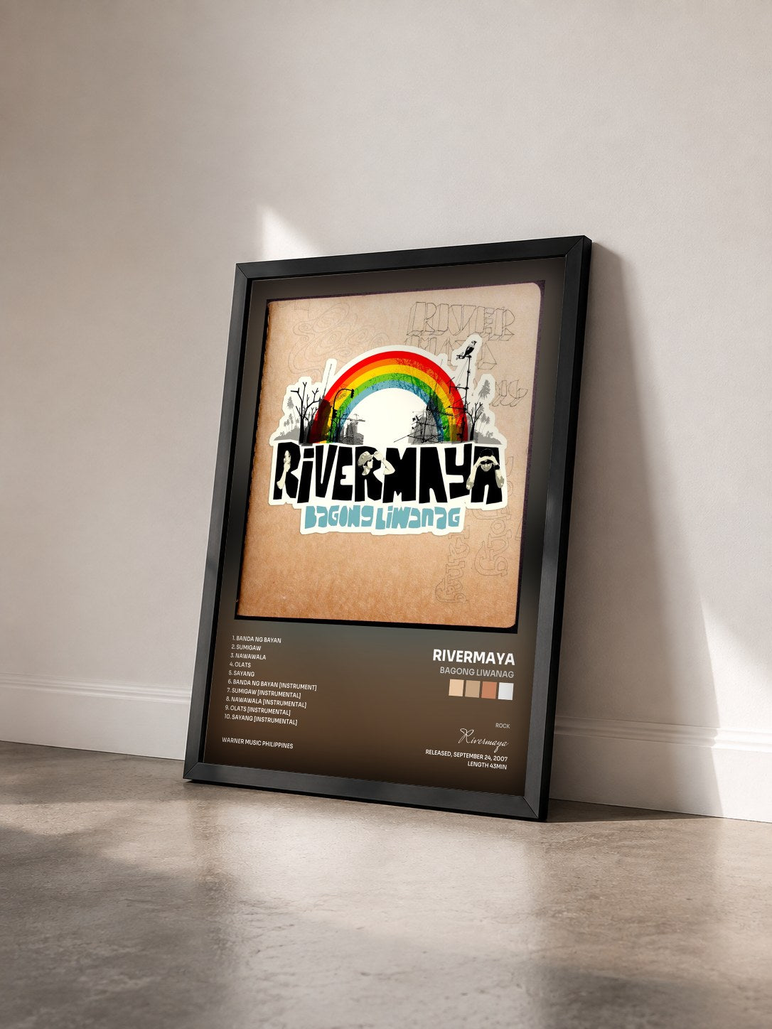 #noir Tableau de l'album Bagong Liwanag de Rivermaya vu de trois quarts, cadre noir