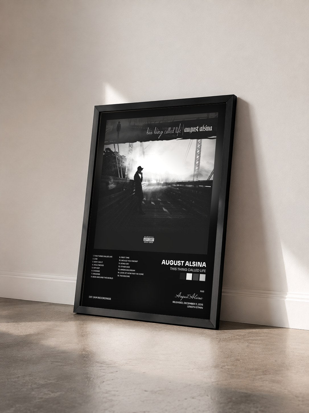 #noir Tableau de l'album This Thing Called Life de August Alsina vu de trois quarts, cadre noir