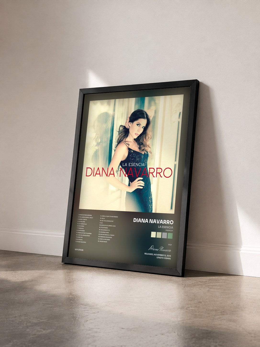 #noir Tableau de l'album La Esencia (Premium) de Diana Navarro vu de trois quarts, cadre noir