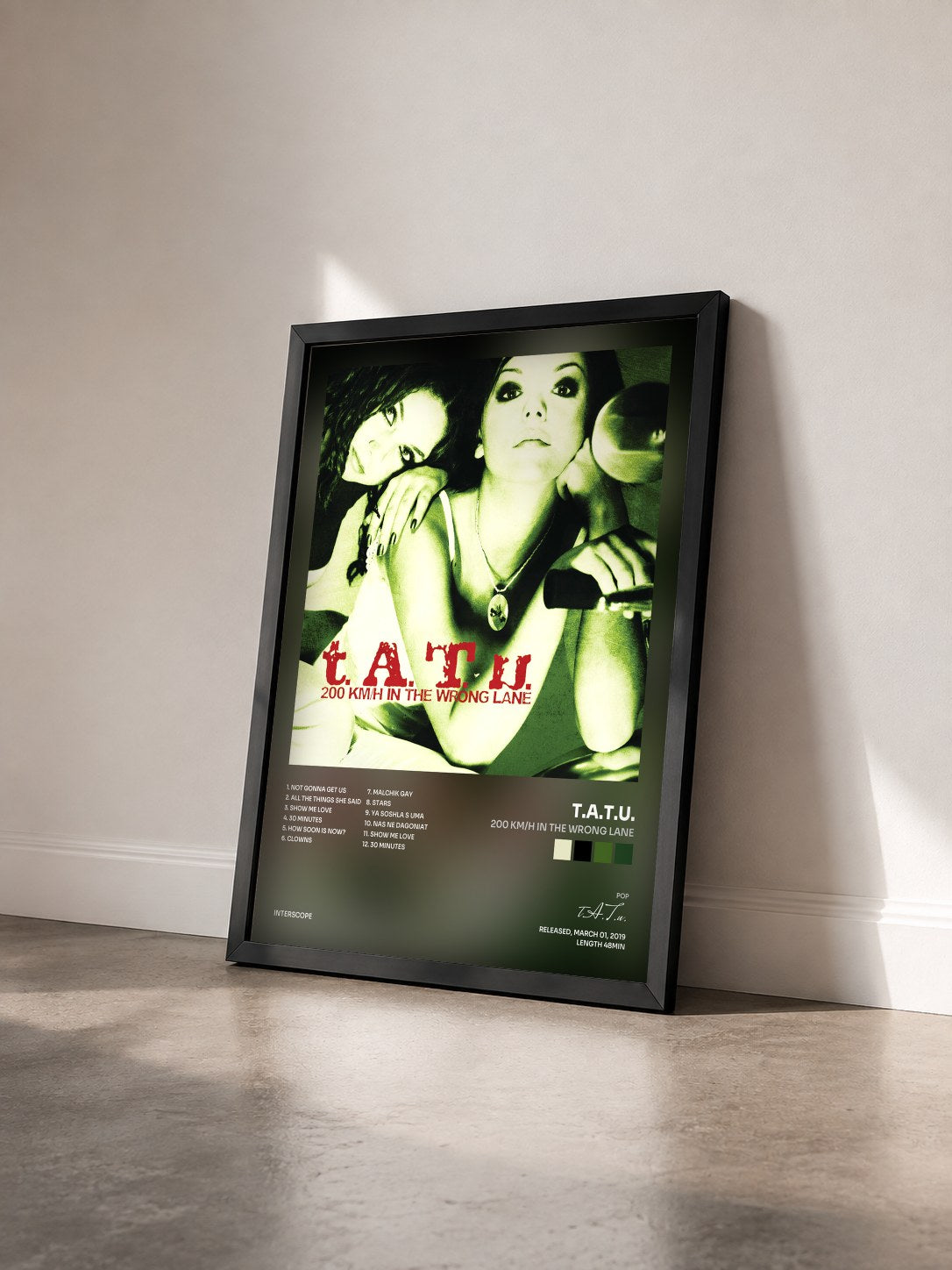 #noir Tableau de l'album 200 KM/H In The Wrong Lane de t.A.T.u. vu de trois quarts, cadre noir
