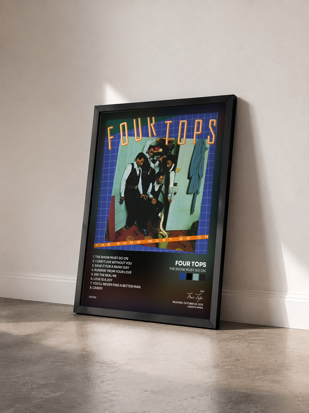 #noir Tableau de l'album The Show Must Go On de Four Tops vu de trois quarts, cadre noir