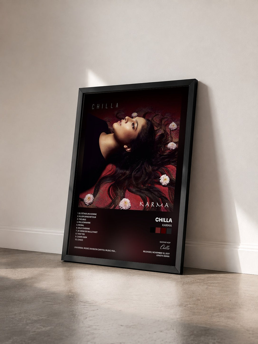 #noir Tableau de l'album Karma de Chilla vu de trois quarts, cadre noir