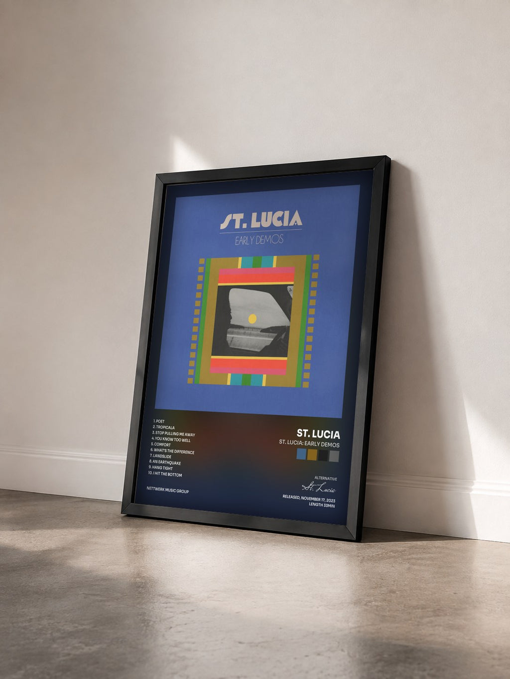 #noir Tableau de l'album St. Lucia: Early Demos de St. Lucia vu de trois quarts, cadre noir