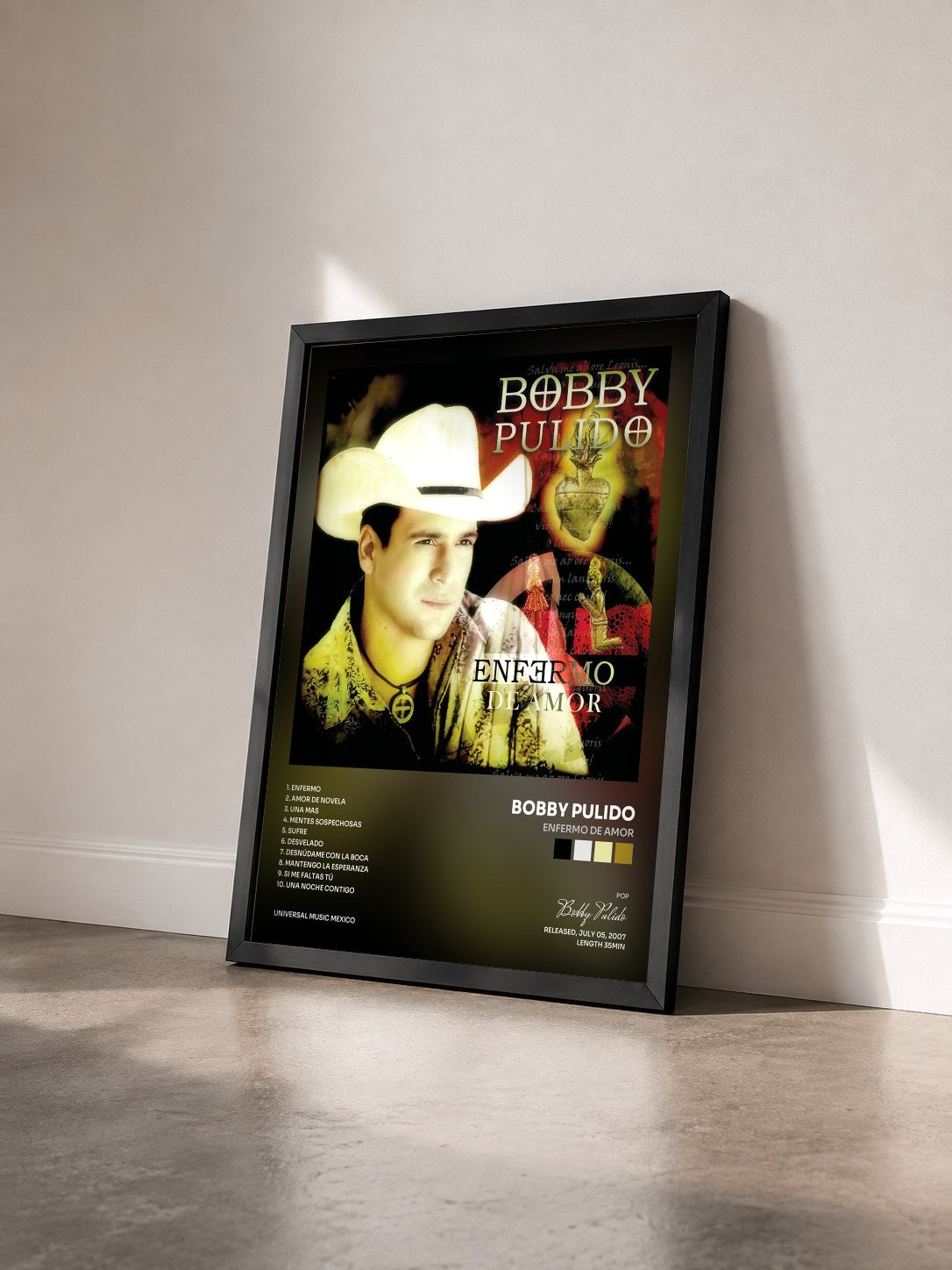 #noir Tableau de l'album Enfermo De Amor de Bobby Pulido vu de trois quarts, cadre noir