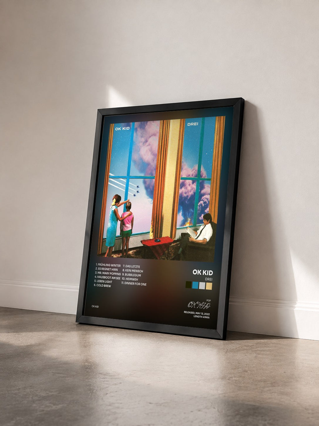 #noir Tableau de l'album DREI de OK KID vu de trois quarts, cadre noir