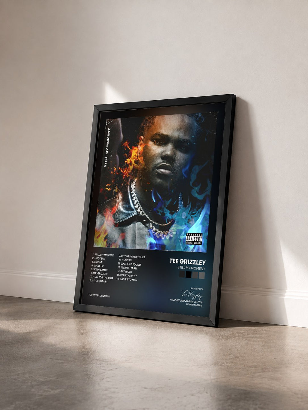 #noir Tableau de l'album Still My Moment de Tee Grizzley vu de trois quarts, cadre noir