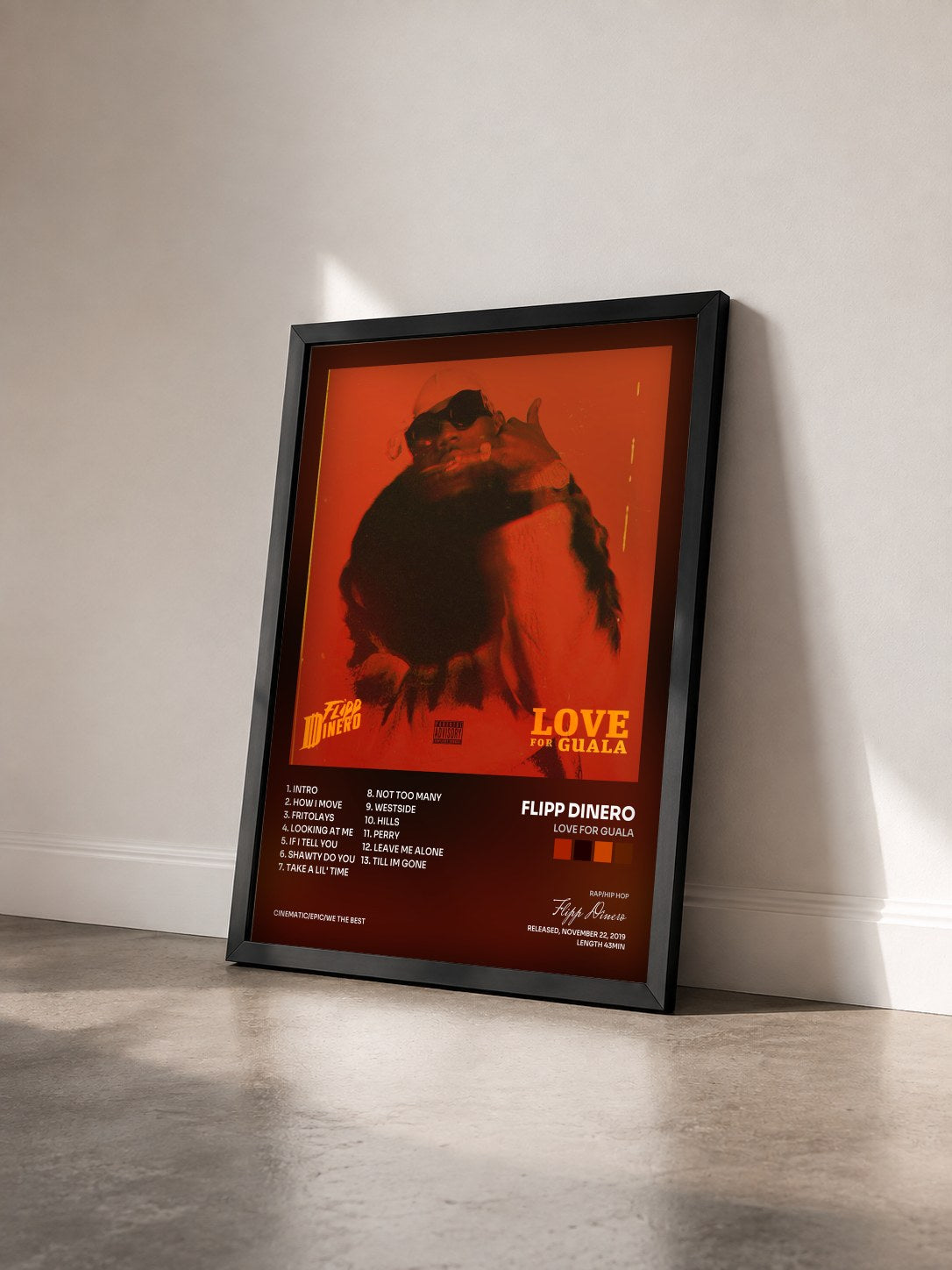 #noir Tableau de l'album LOVE FOR GUALA de Flipp Dinero vu de trois quarts, cadre noir