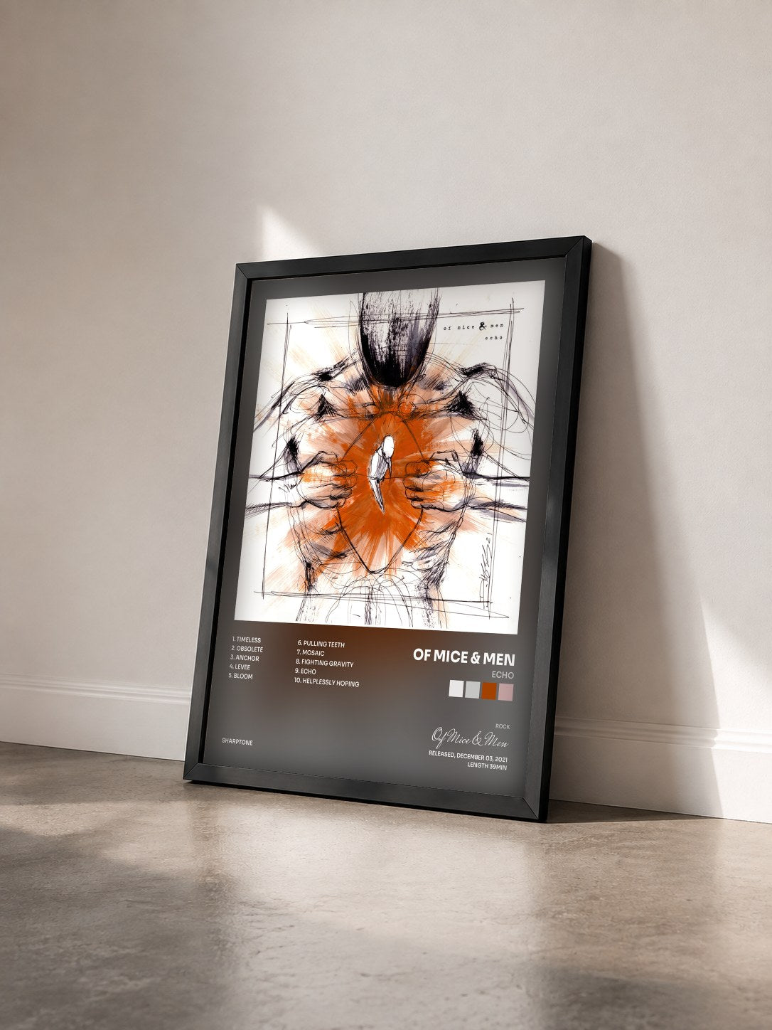 #noir Tableau de l'album Echo de Of Mice & Men vu de trois quarts, cadre noir