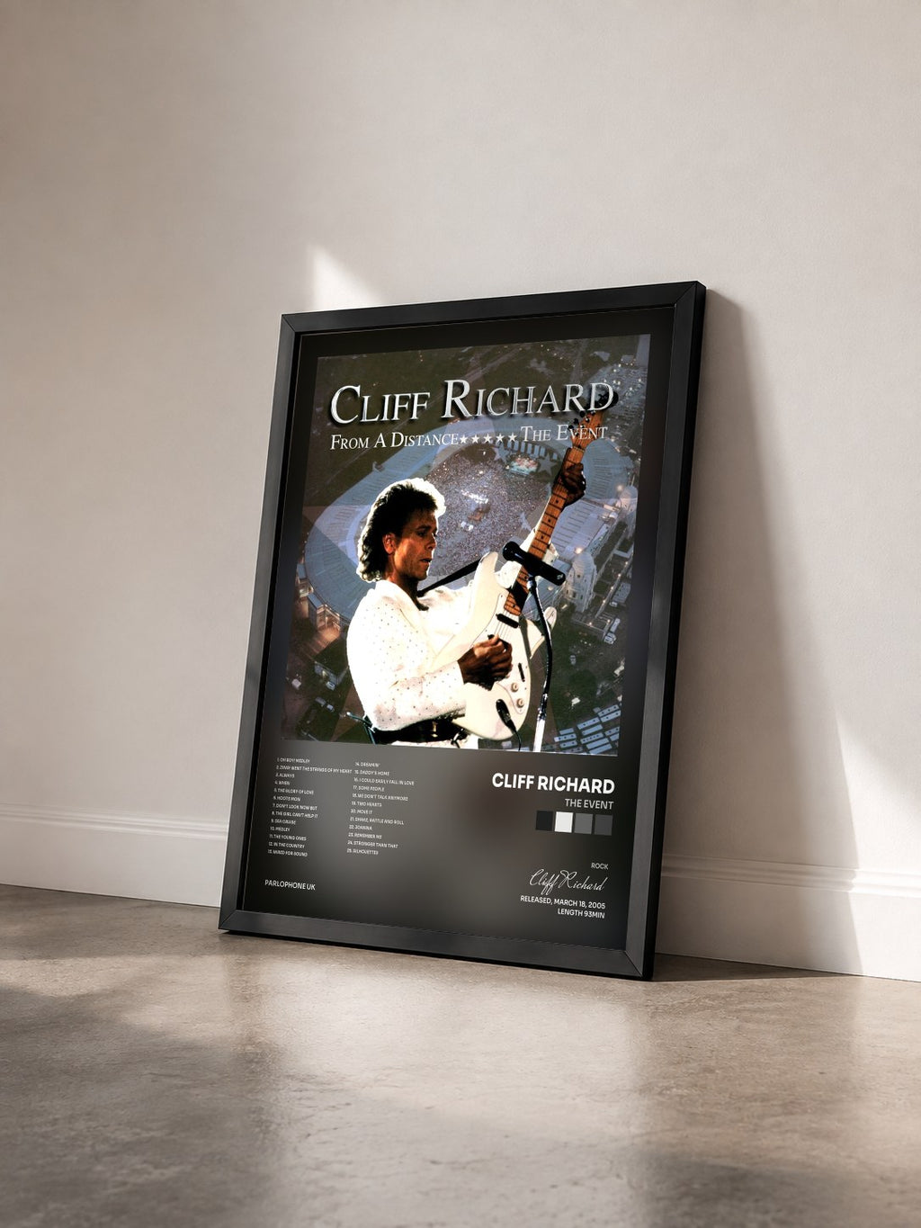 #noir Tableau de l'album The Event de Cliff Richard vu de trois quarts, cadre noir