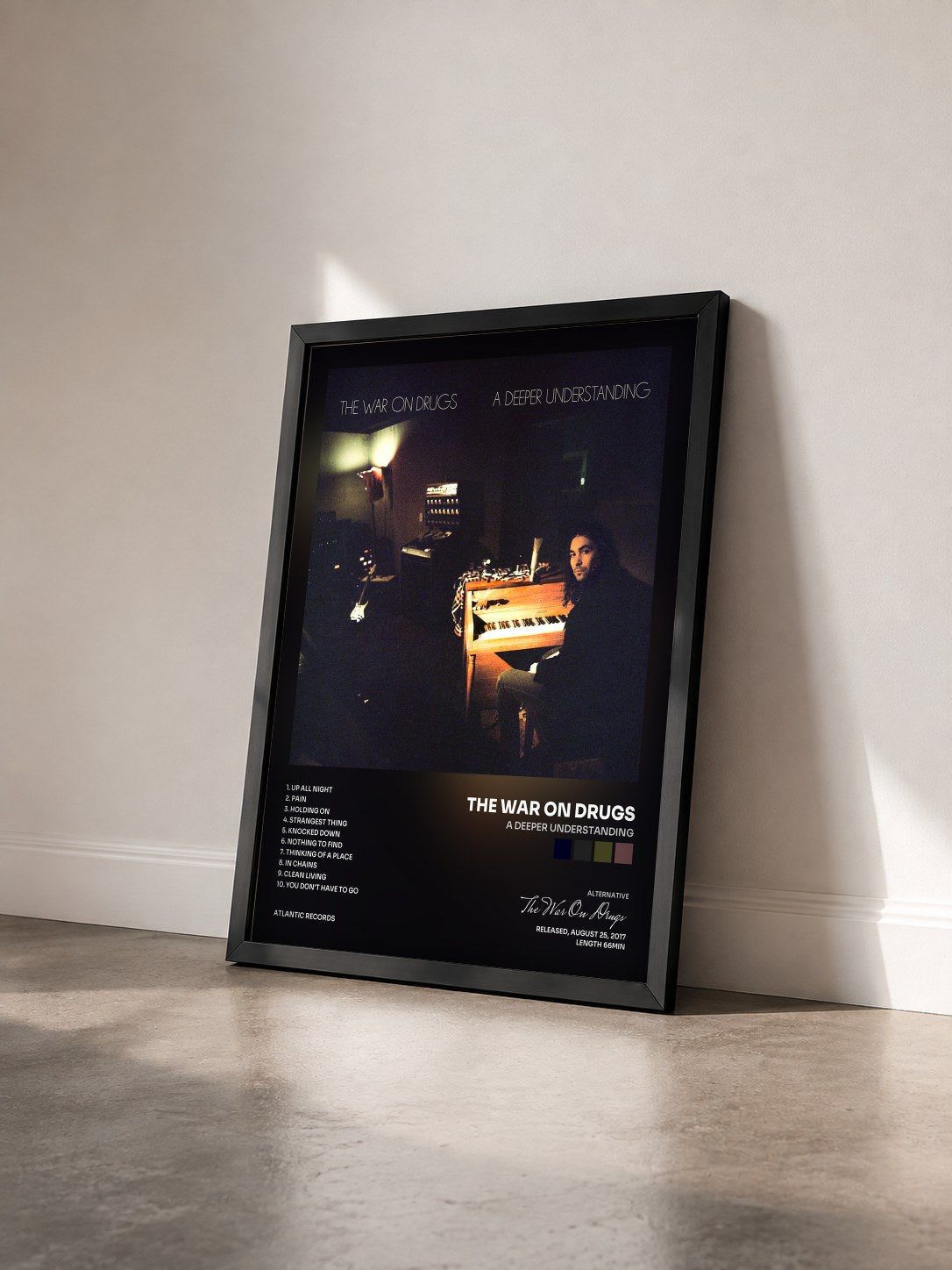 #noir Tableau de l'album A Deeper Understanding de The War On Drugs vu de trois quarts, cadre noir