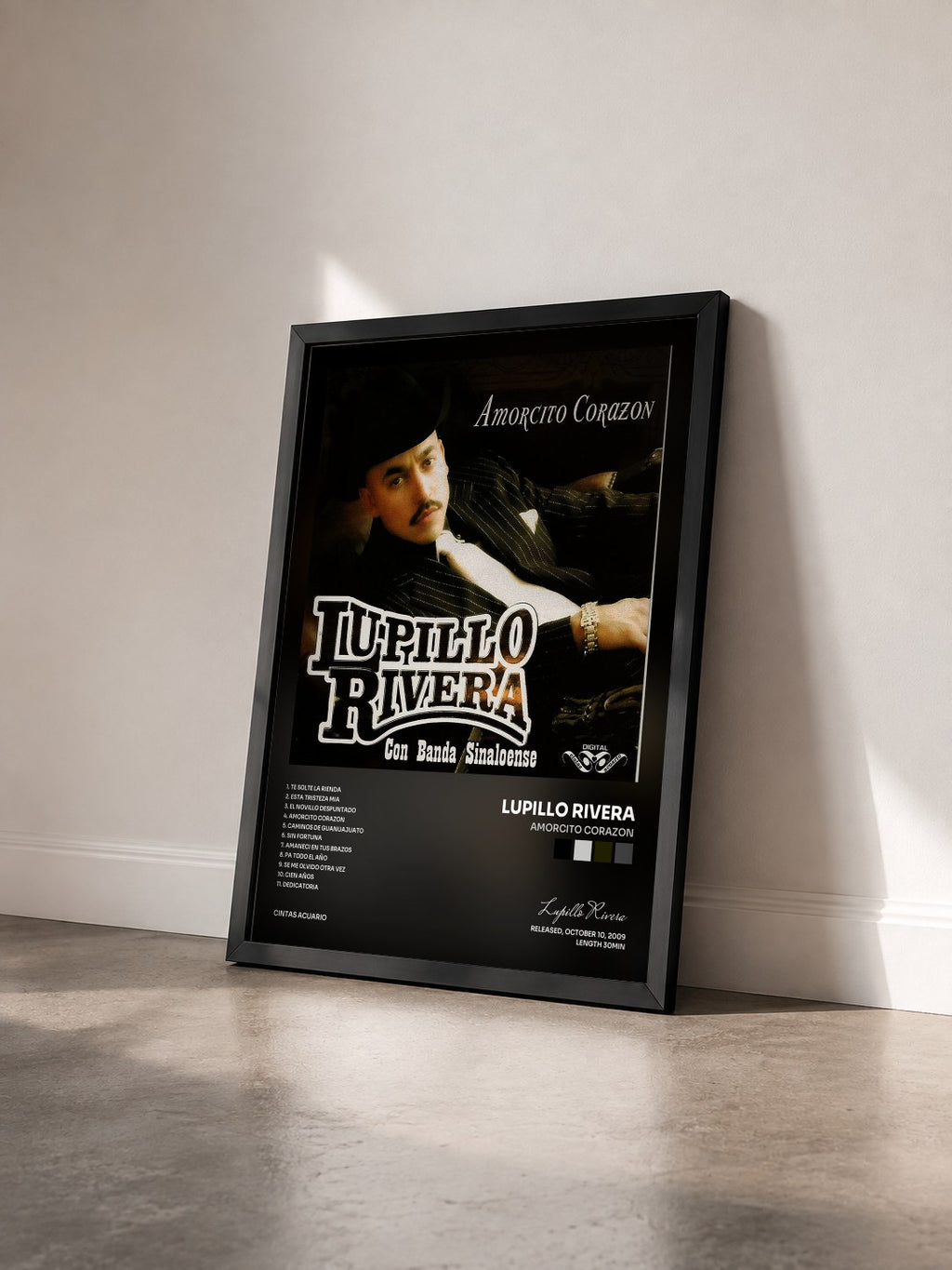 #noir Tableau de l'album Amorcito Corazon de Lupillo Rivera vu de trois quarts, cadre noir