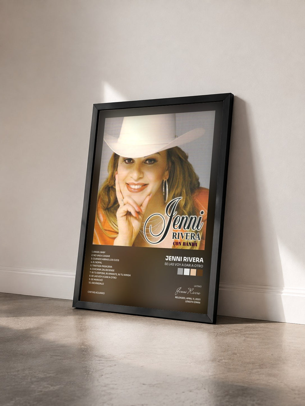#noir Tableau de l'album Se las Voy a Dar a Otro de Jenni Rivera vu de trois quarts, cadre noir