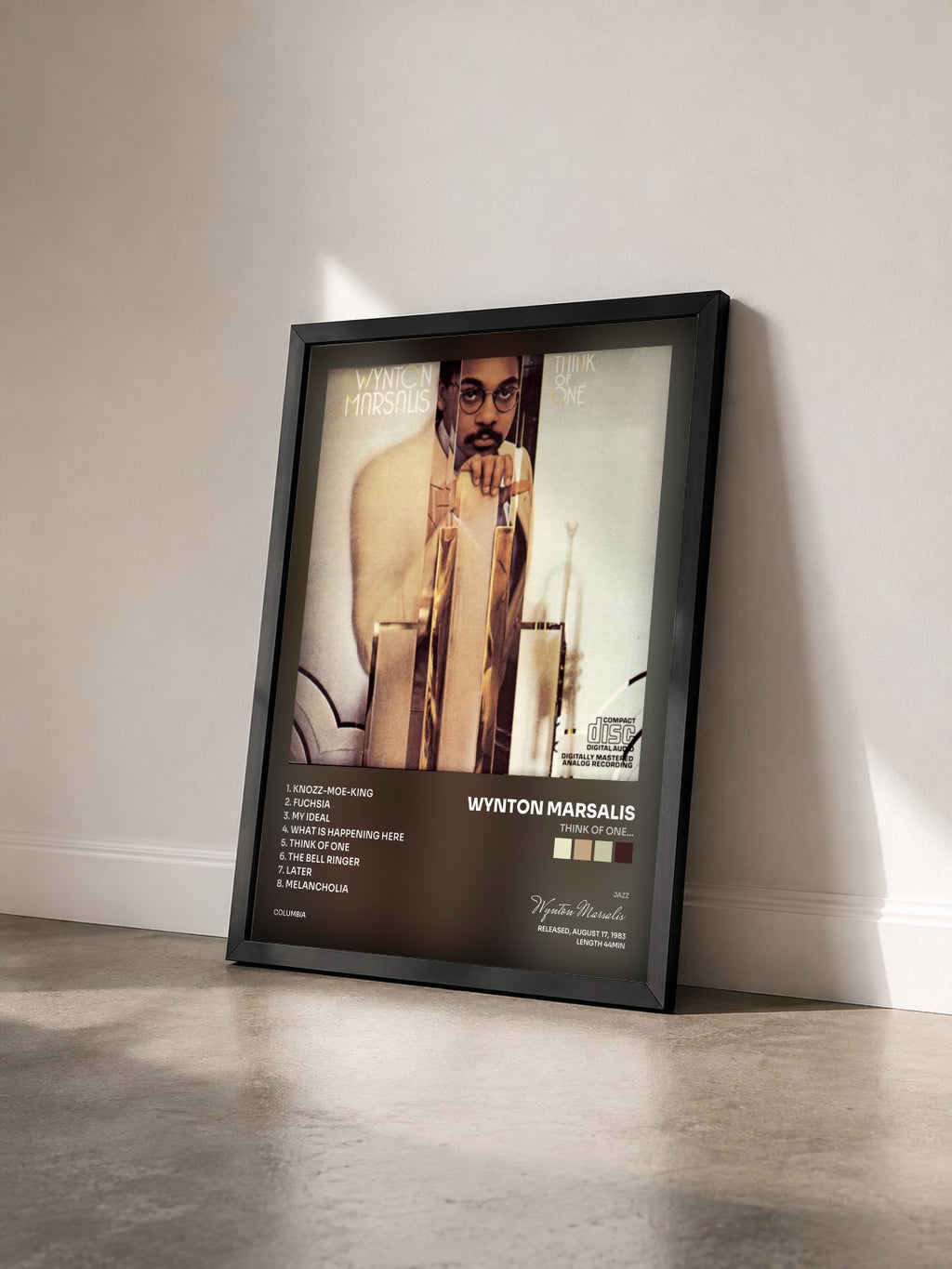 #noir Tableau de l'album Think Of One... de Wynton Marsalis vu de trois quarts, cadre noir