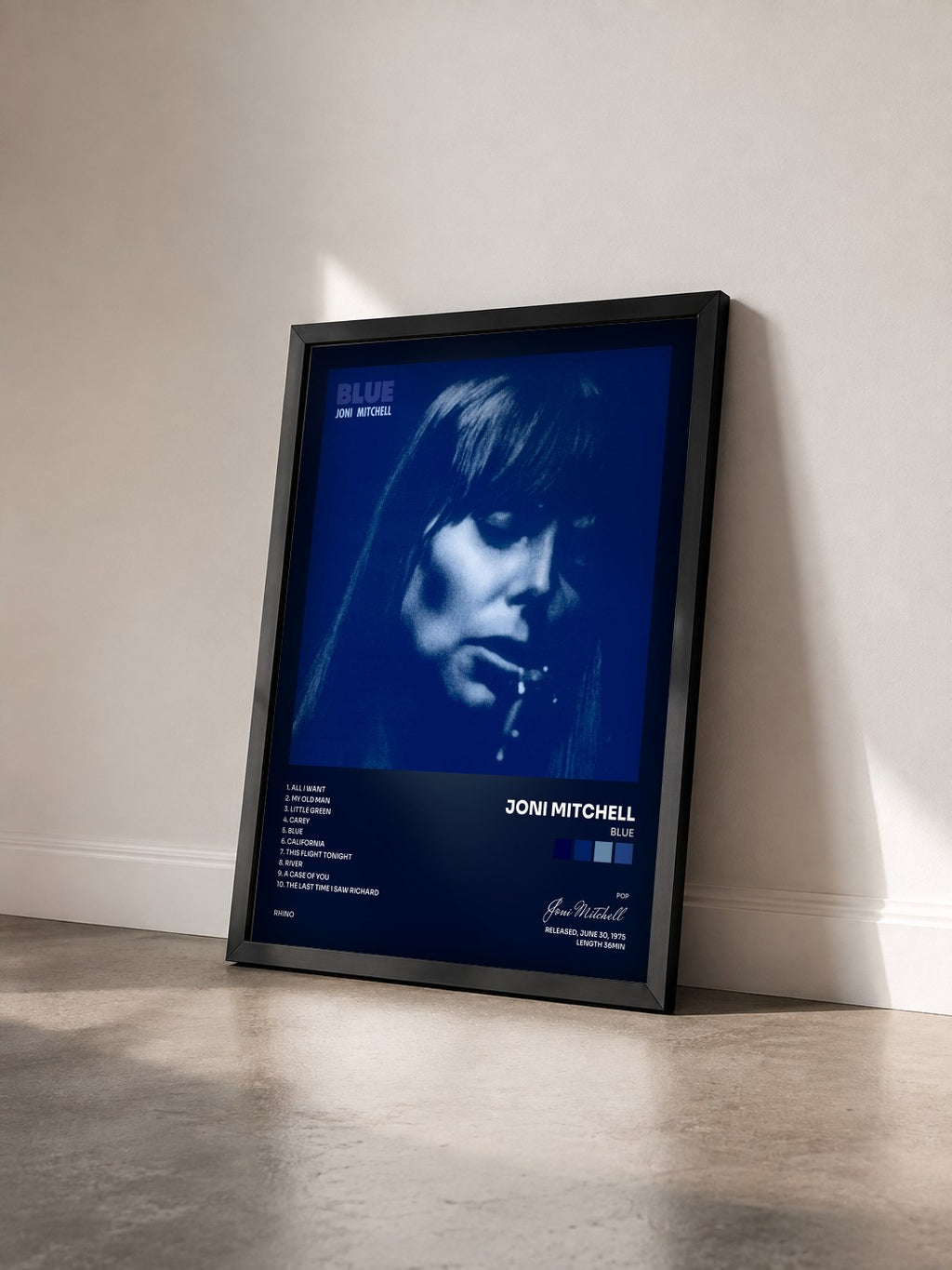 #noir Tableau de l'album Blue de Joni Mitchell vu de trois quarts, cadre noir