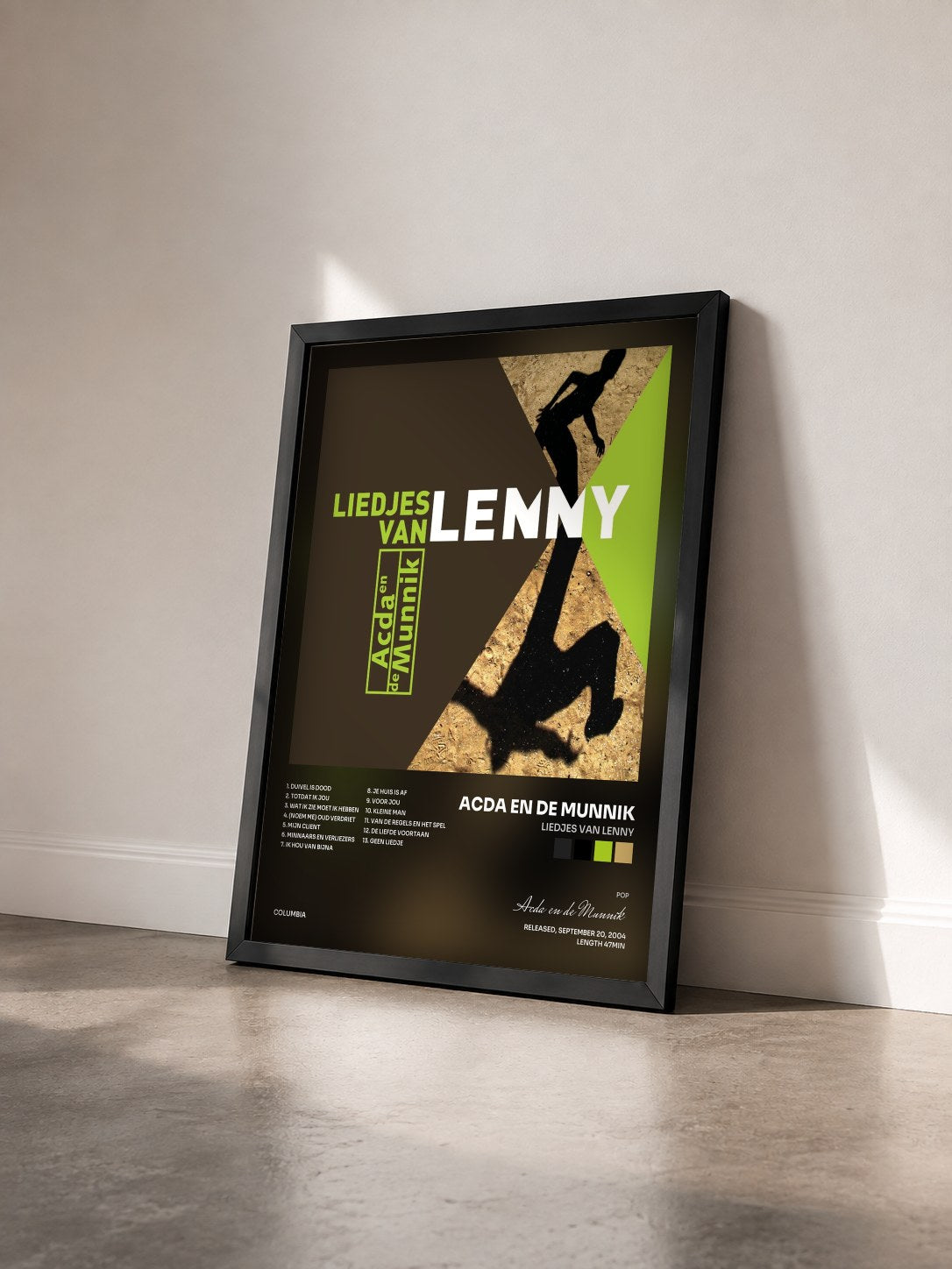 #noir Tableau de l'album Liedjes Van Lenny de Acda en de Munnik vu de trois quarts, cadre noir