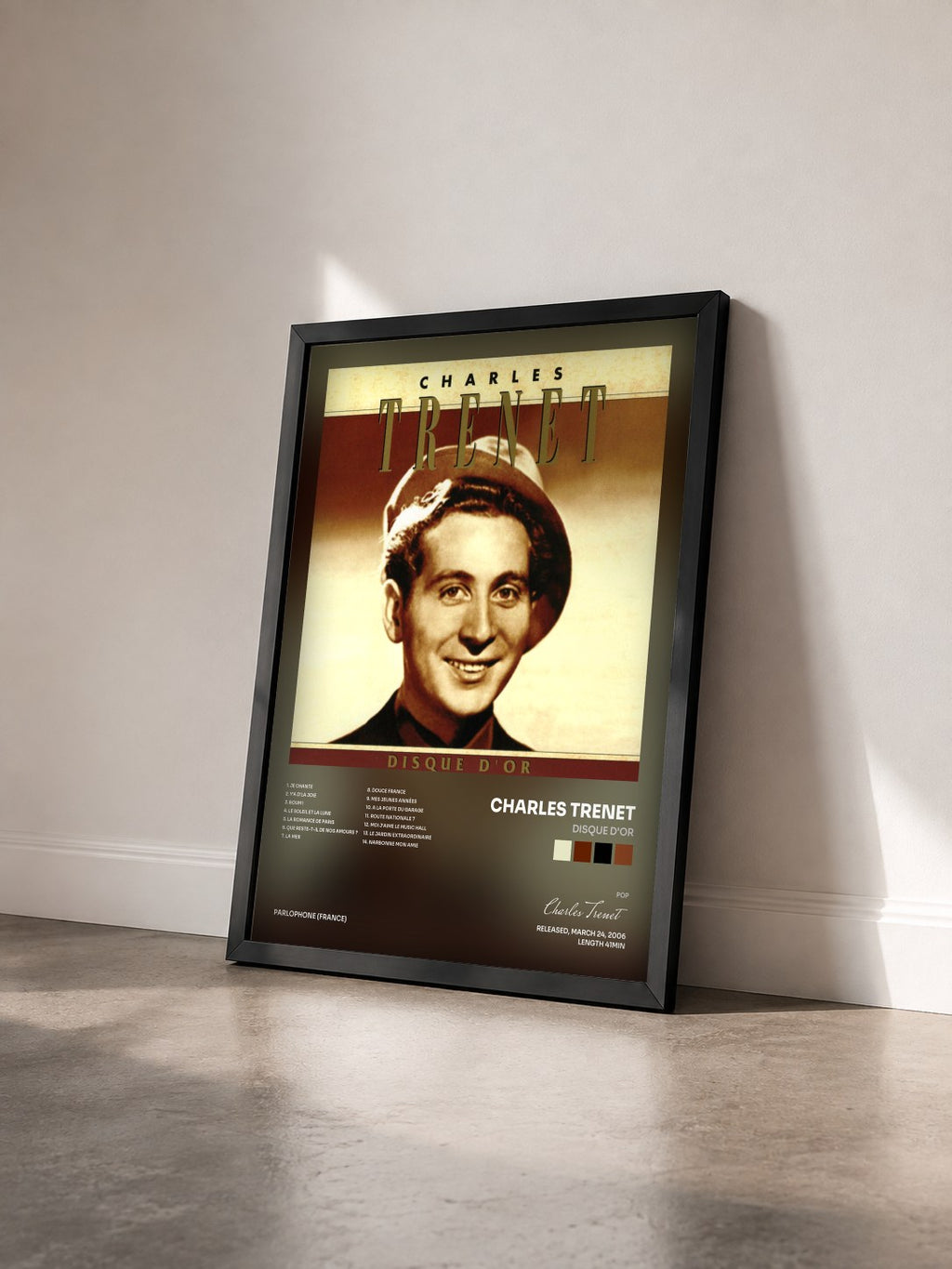#noir Tableau de l'album Disque D'or de Charles Trenet vu de trois quarts, cadre noir