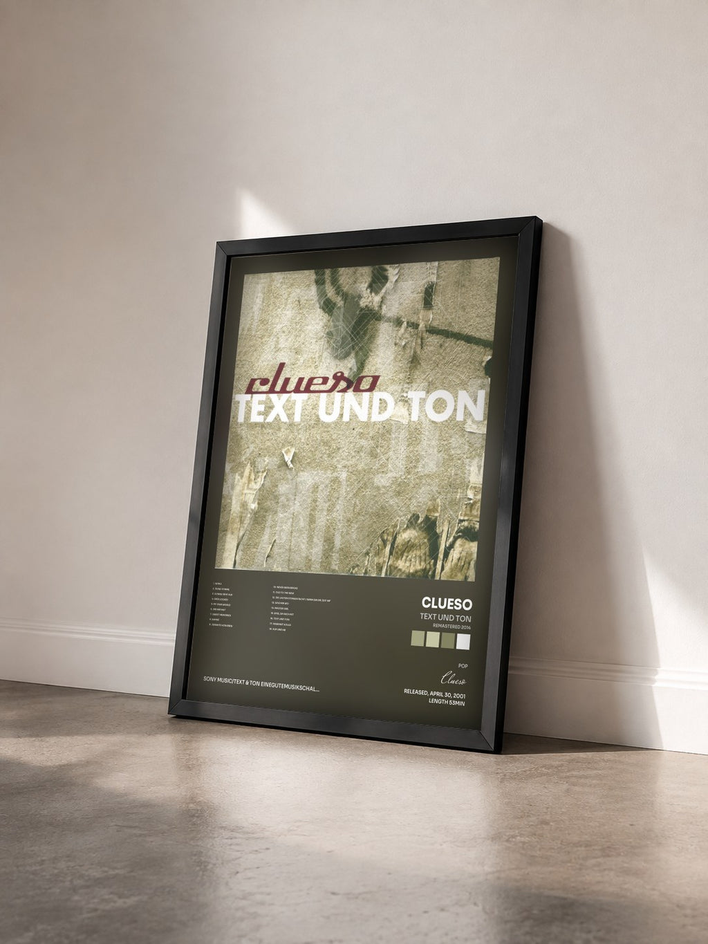 #noir Tableau de l'album Text und Ton (Remastered 2014) de Clueso vu de trois quarts, cadre noir