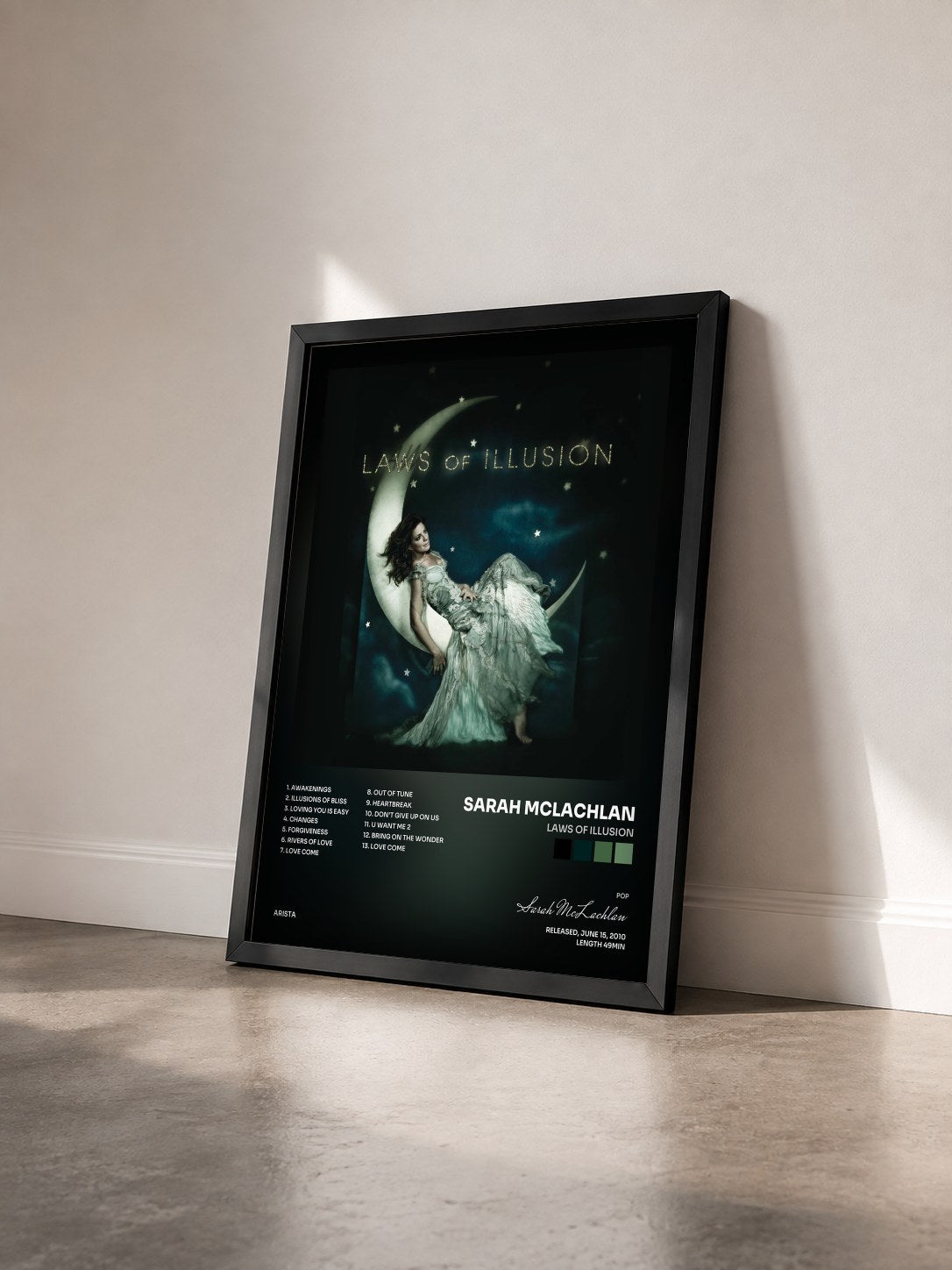 #noir Tableau de l'album Laws Of Illusion de Sarah McLachlan vu de trois quarts, cadre noir