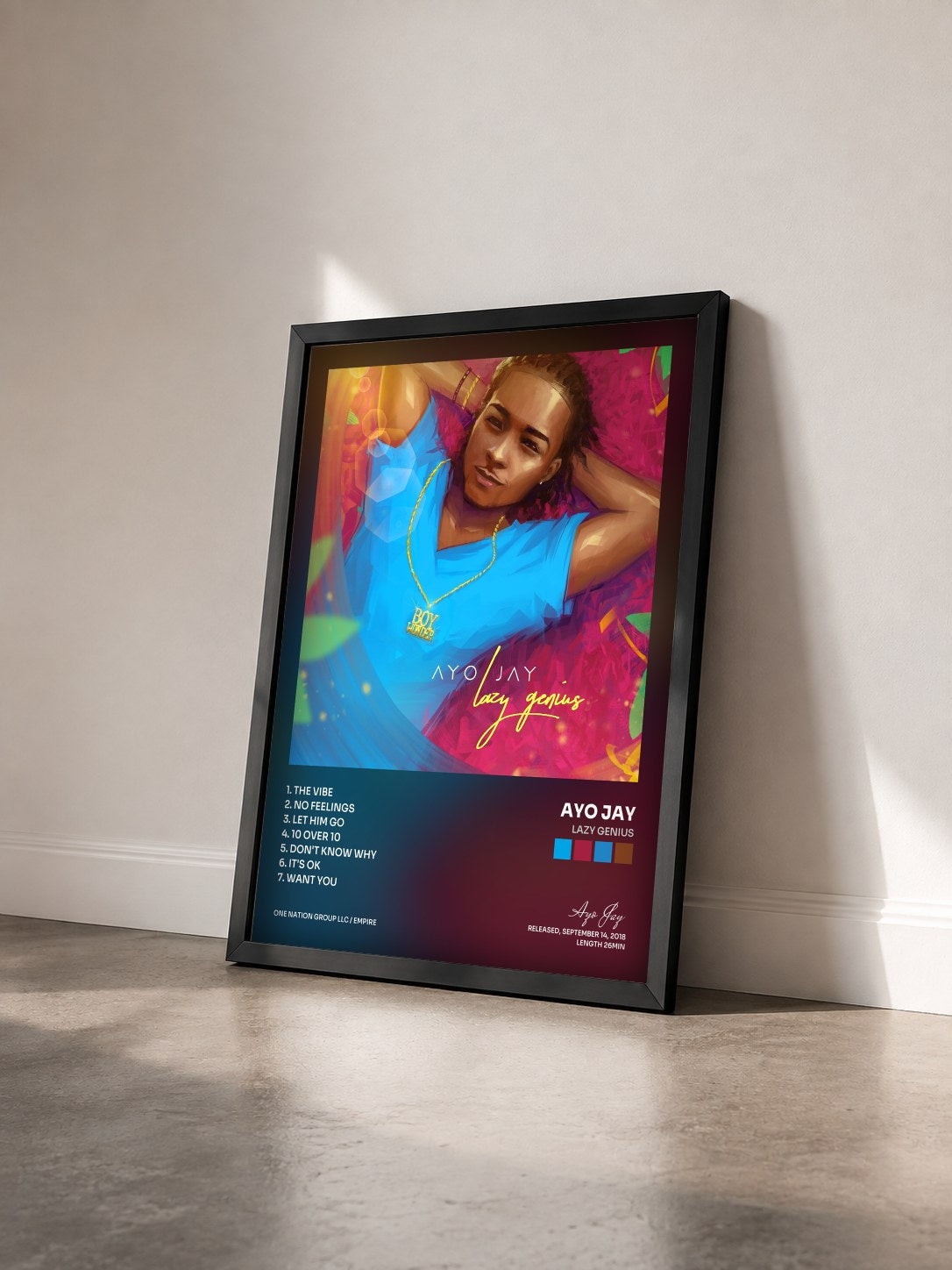 #noir Tableau de l'album Lazy Genius de Ayo Jay vu de trois quarts, cadre noir