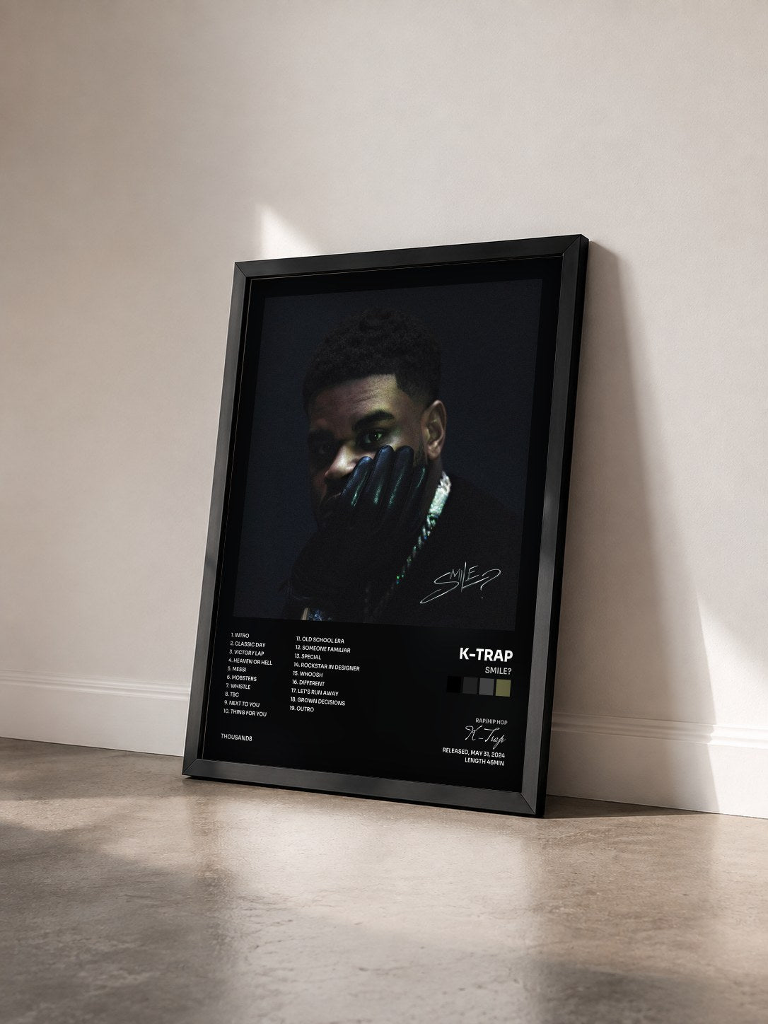 #noir Tableau de l'album SMILE? de K-Trap vu de trois quarts, cadre noir