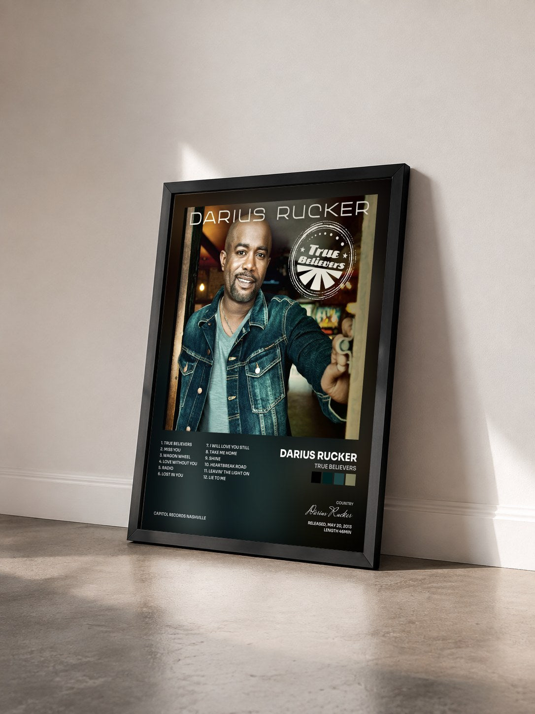 #noir Tableau de l'album True Believers de Darius Rucker vu de trois quarts, cadre noir