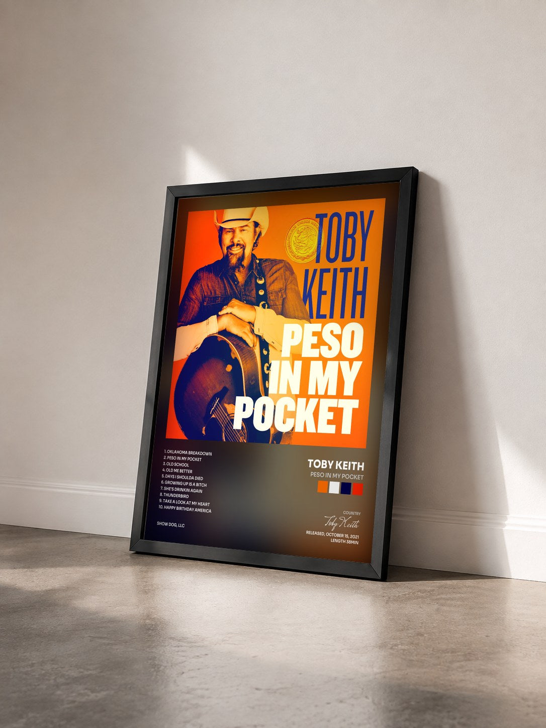 #noir Tableau de l'album Peso in My Pocket de Toby Keith vu de trois quarts, cadre noir