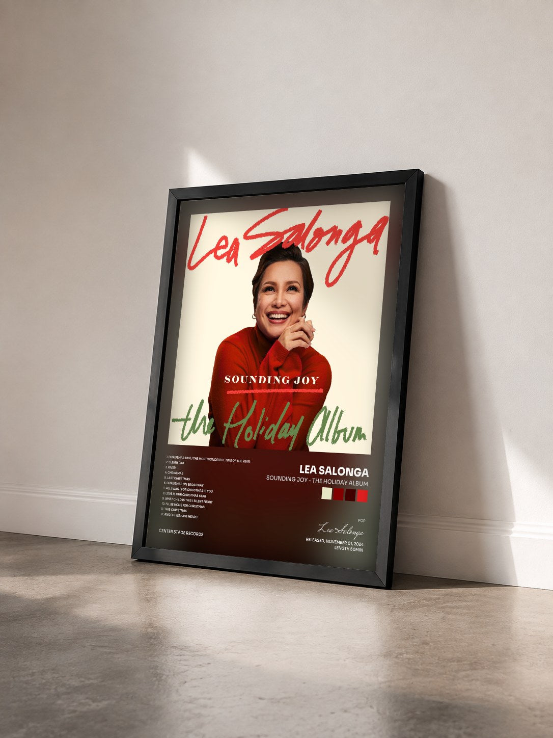 #noir Tableau de l'album Sounding Joy - The Holiday Album de Lea Salonga vu de trois quarts, cadre noir