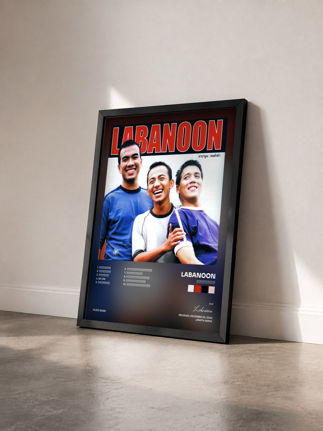 #noir Tableau de l'album คนตัวดำ de Labanoon vu de trois quarts, cadre noir