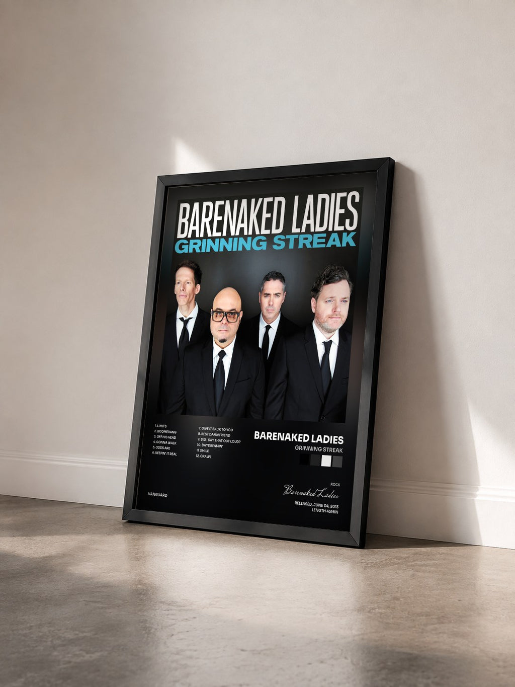 #noir Tableau de l'album Grinning Streak de Barenaked Ladies vu de trois quarts, cadre noir