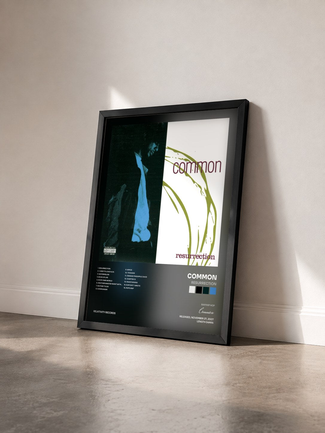 #noir Tableau de l'album Resurrection de Common vu de trois quarts, cadre noir