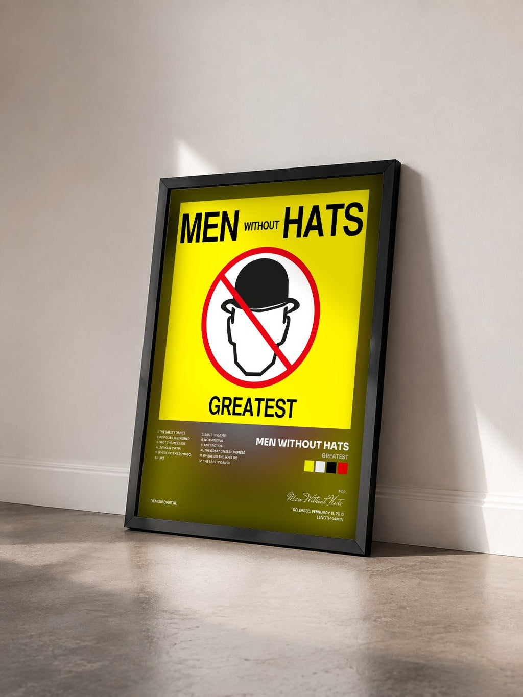 #noir Tableau de l'album Greatest de Men Without Hats vu de trois quarts, cadre noir