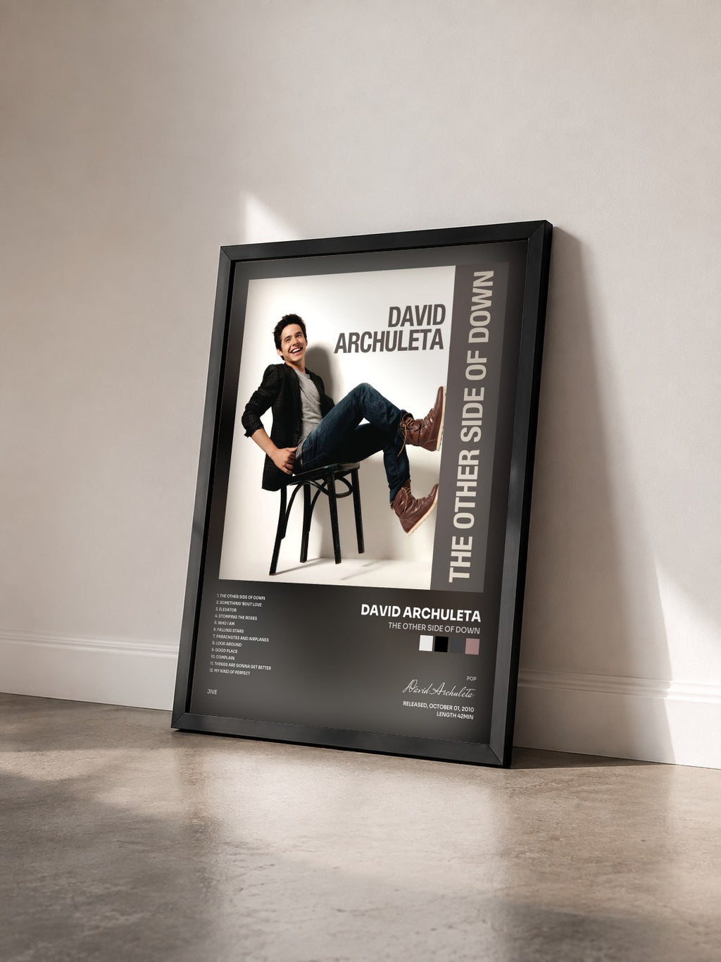 #noir Tableau de l'album The Other Side of Down de David Archuleta vu de trois quarts, cadre noir
