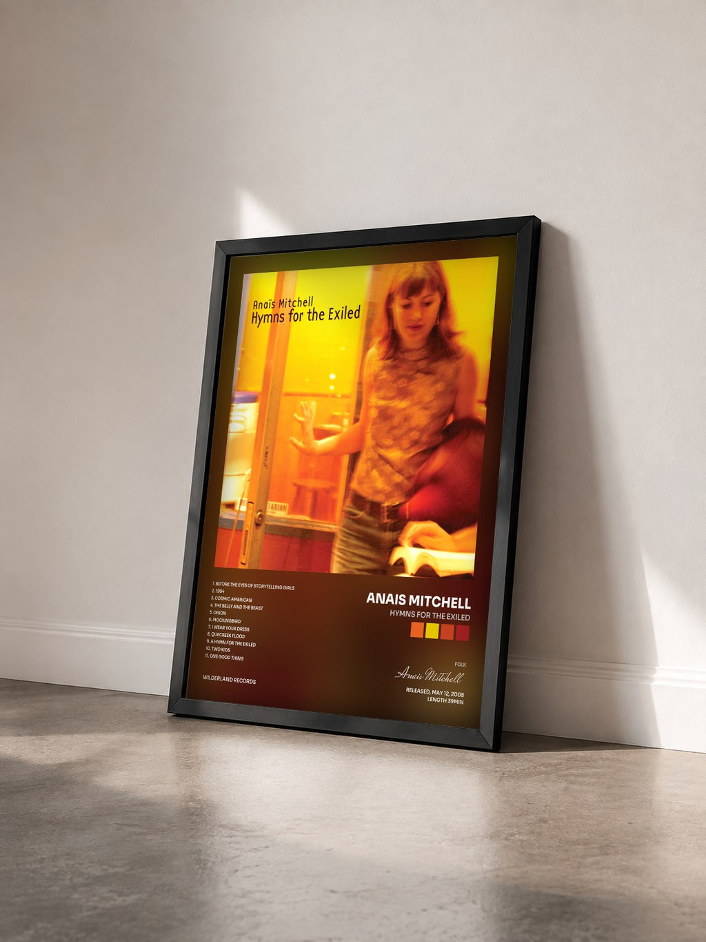 #noir Tableau de l'album Hymns for the Exiled de Anais Mitchell vu de trois quarts, cadre noir
