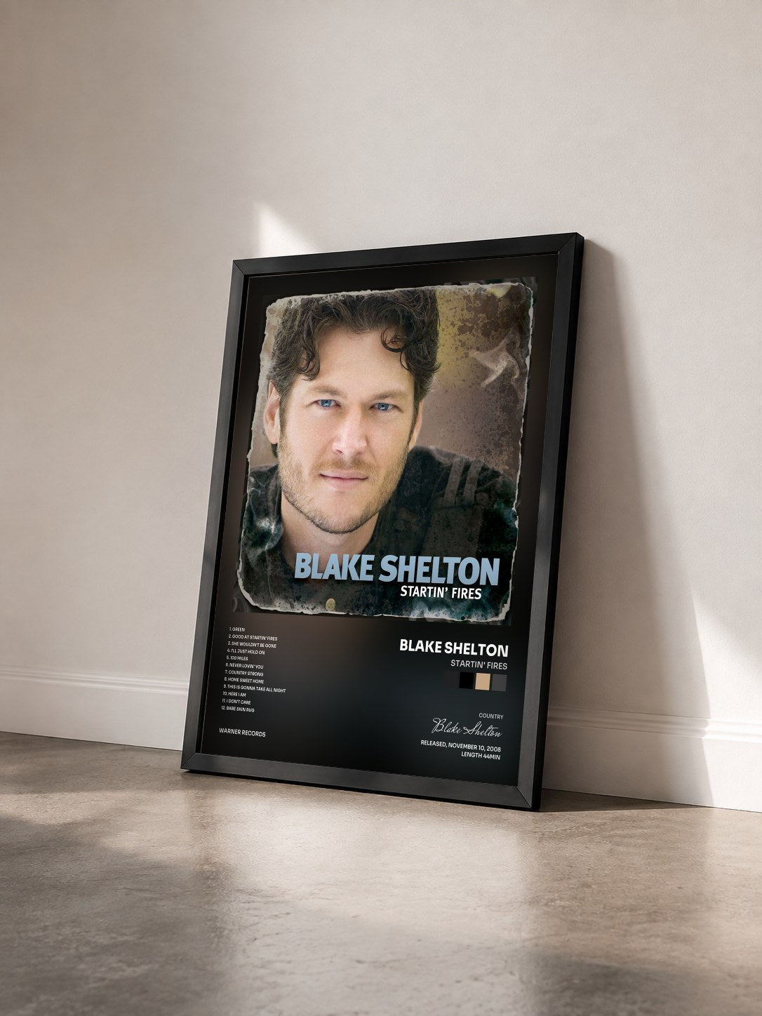 #noir Tableau de l'album Startin' Fires de Blake Shelton vu de trois quarts, cadre noir