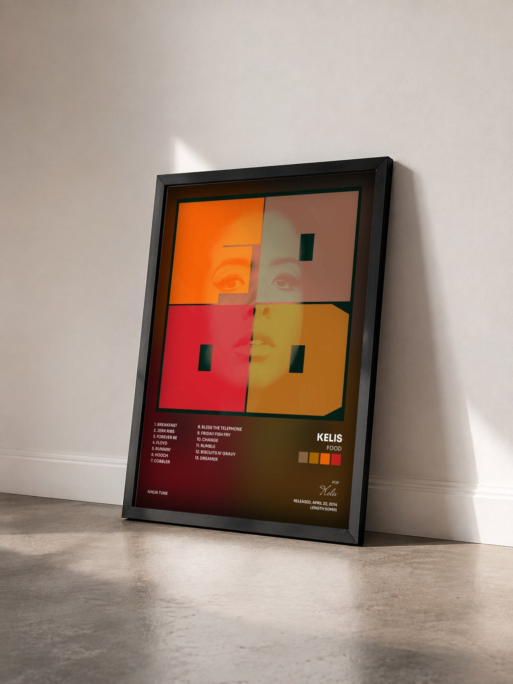 #noir Tableau de l'album Food de Kelis vu de trois quarts, cadre noir