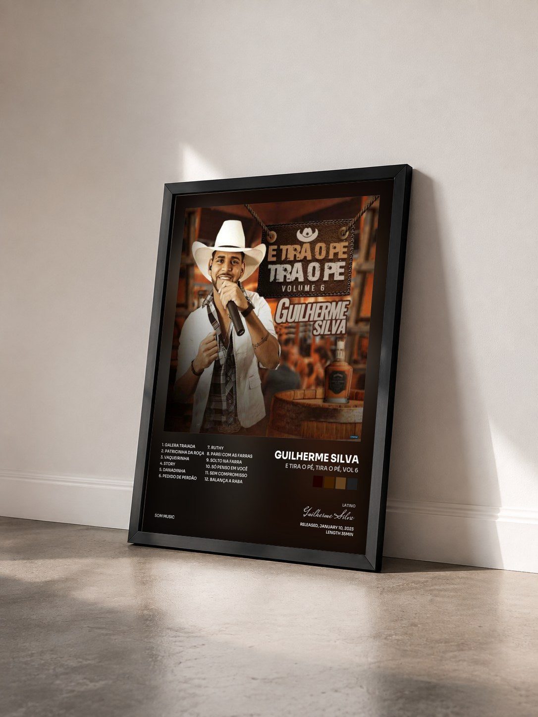 #noir Tableau de l'album E Tira o Pé, Tira o Pé, Vol 6 de Guilherme Silva vu de trois quarts, cadre noir
