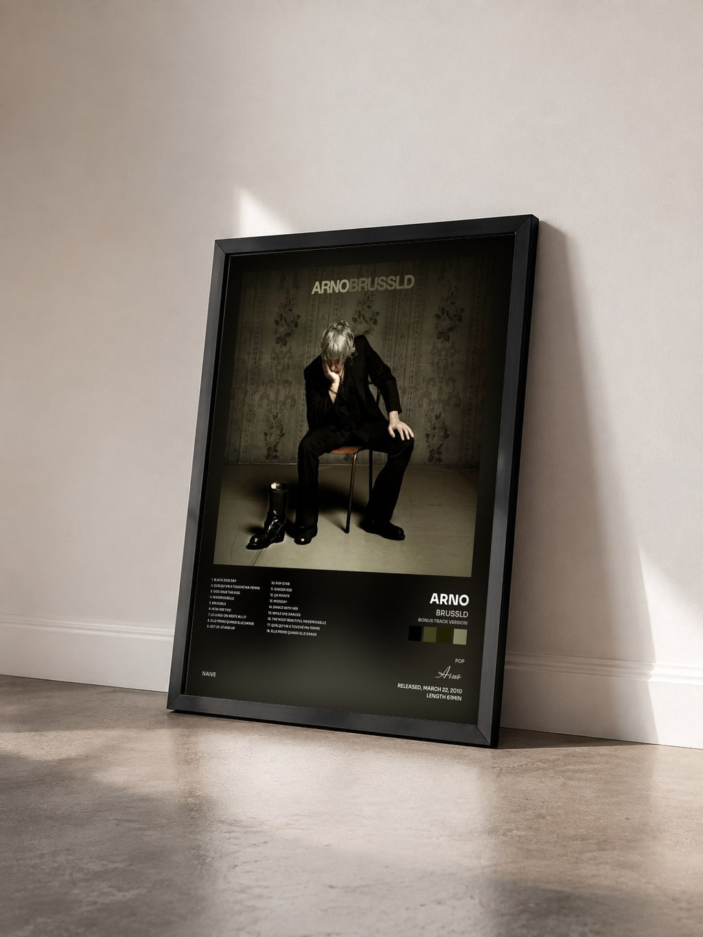 #noir Tableau de l'album Brussld (Bonus Track Version) de Arno vu de trois quarts, cadre noir