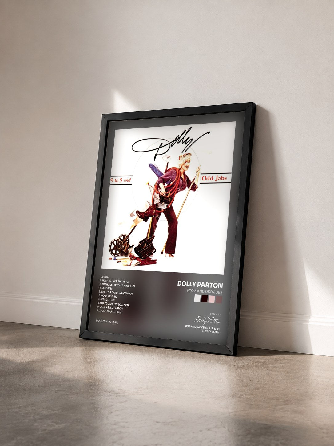 #noir Tableau de l'album 9 To 5 And Odd Jobs de Dolly Parton vu de trois quarts, cadre noir