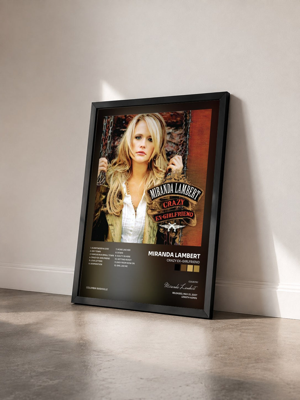 #noir Tableau de l'album Crazy Ex-Girlfriend de Miranda Lambert vu de trois quarts, cadre noir