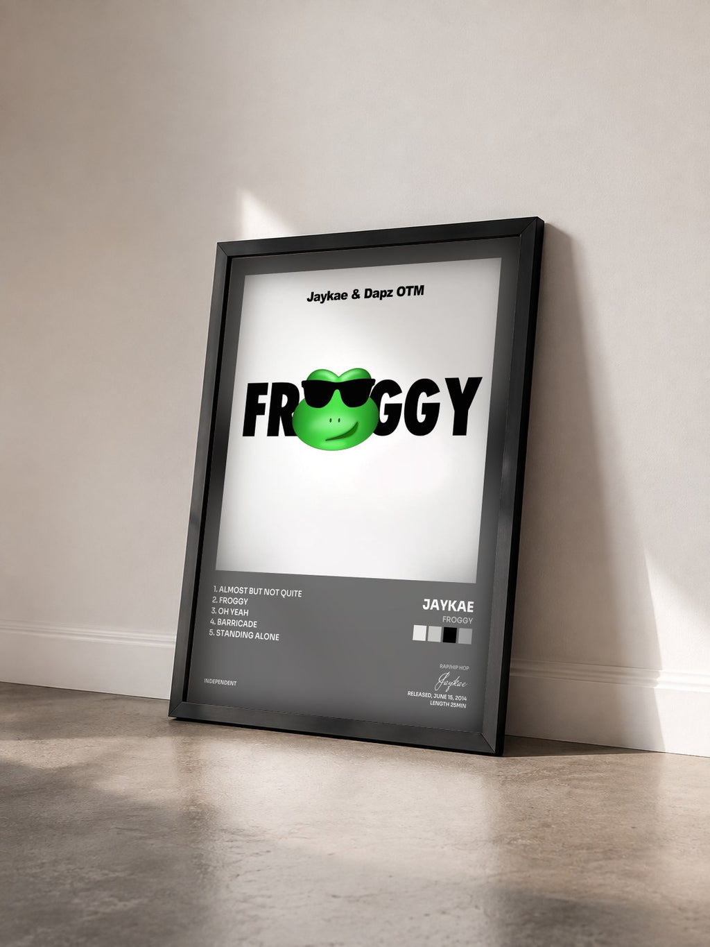 #noir Tableau de l'album Froggy de Jaykae vu de trois quarts, cadre noir