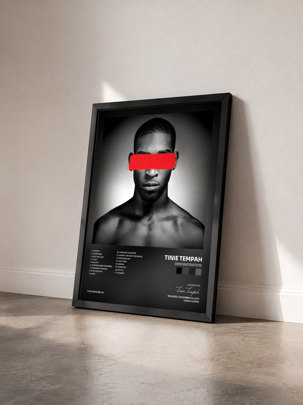 #noir Tableau de l'album Demonstration de Tinie Tempah vu de trois quarts, cadre noir