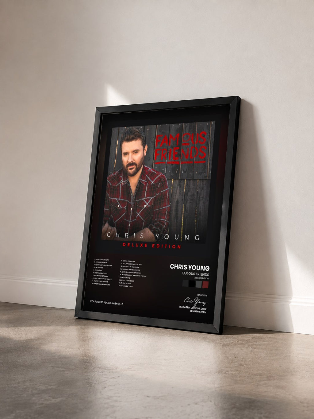 #noir Tableau de l'album Famous Friends (Deluxe Edition) de Chris Young vu de trois quarts, cadre noir